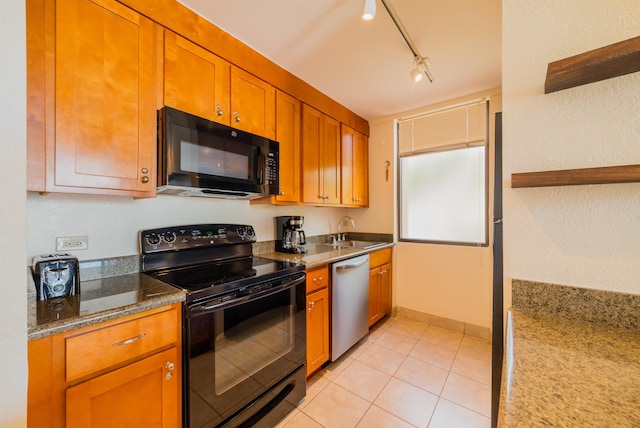 kitchen featuring a sink, light tile patterned floors, open shelves, brown cabinetry, and black appliances