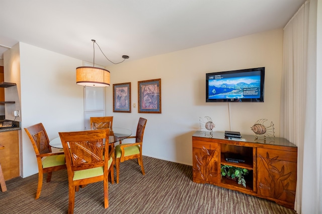 dining room with carpet floors