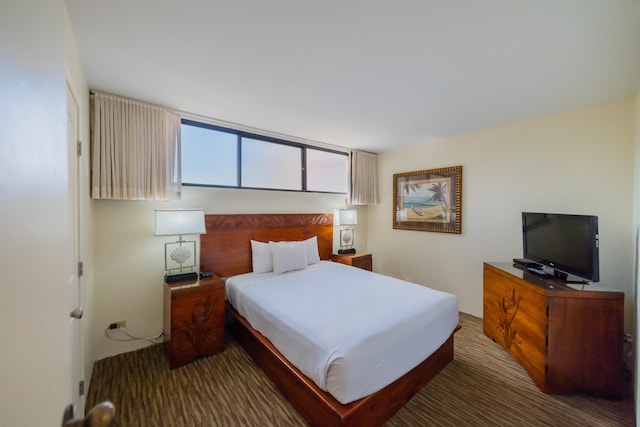 bedroom featuring carpet flooring