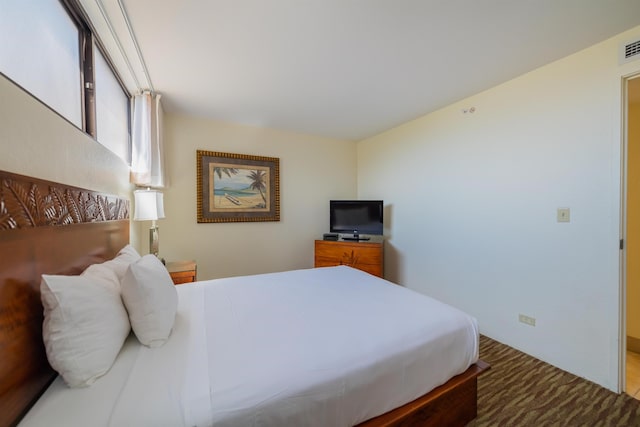 bedroom with visible vents