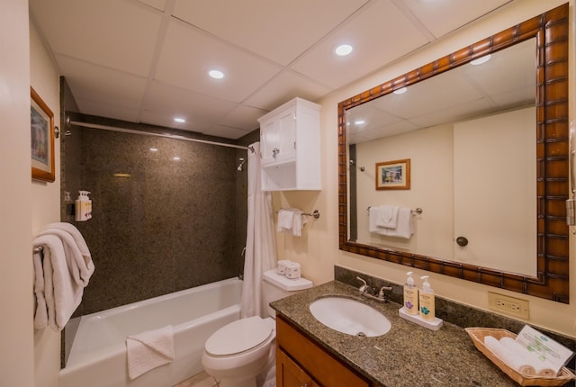 full bath featuring shower / bath combo, a drop ceiling, toilet, recessed lighting, and vanity
