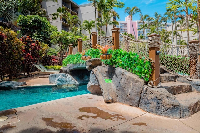 exterior space with a patio and fence