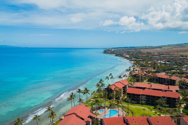 bird's eye view with a view of the beach and a water view