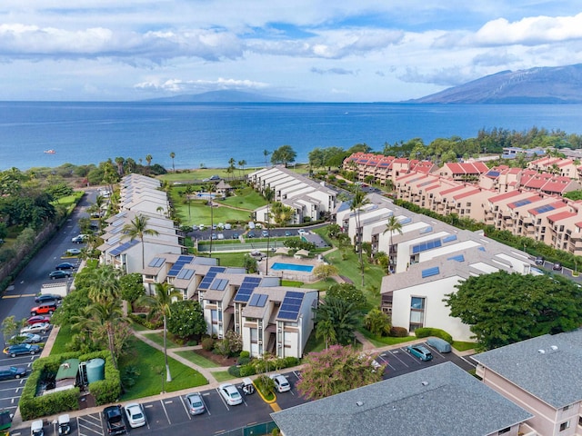 bird's eye view featuring a water and mountain view