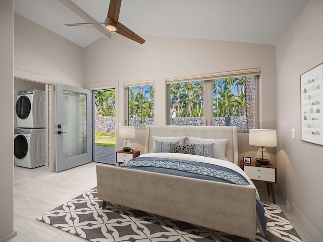 bedroom featuring stacked washer / drying machine, access to exterior, multiple windows, high vaulted ceiling, and ceiling fan