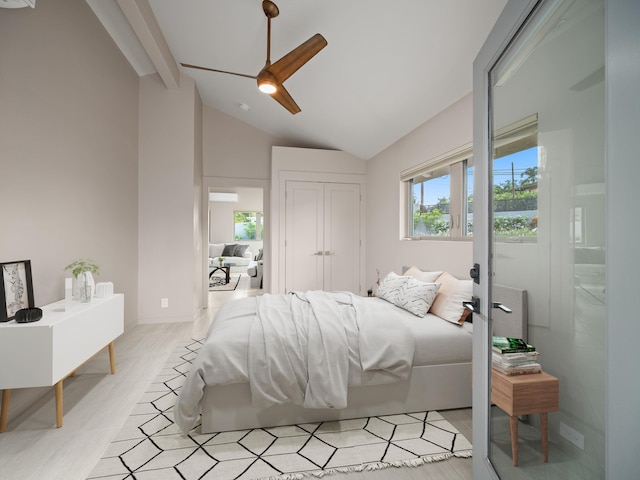 bedroom with a ceiling fan and a closet