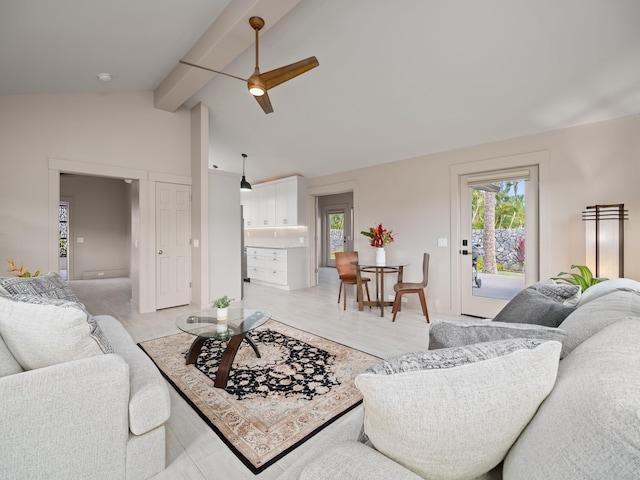 living room featuring healthy amount of natural light and ceiling fan