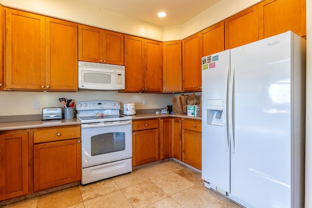 kitchen featuring white appliances