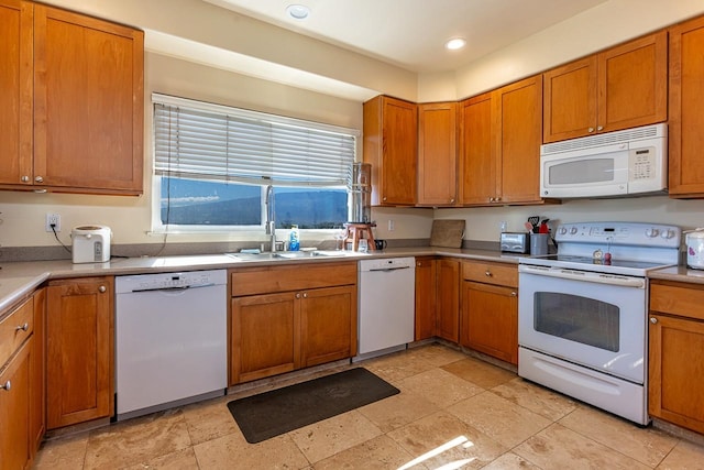 kitchen with sink and white appliances