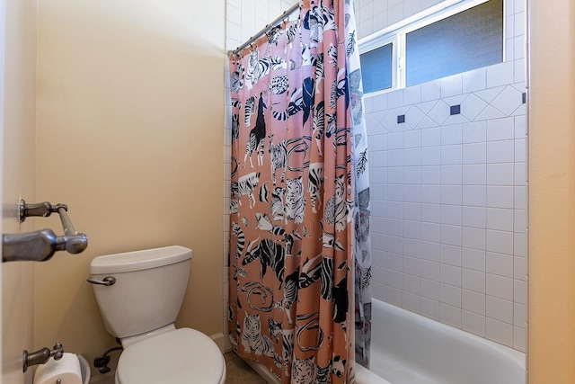 bathroom with shower / bath combination with curtain and toilet