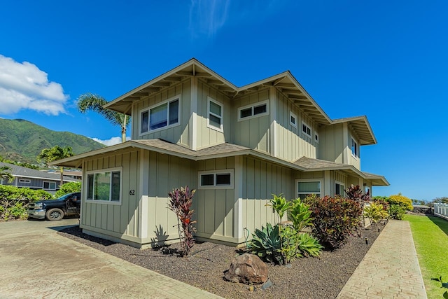 view of home's exterior featuring a mountain view