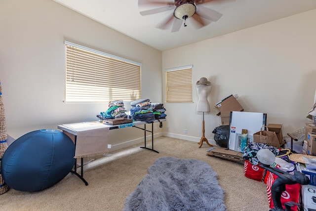 interior space featuring ceiling fan