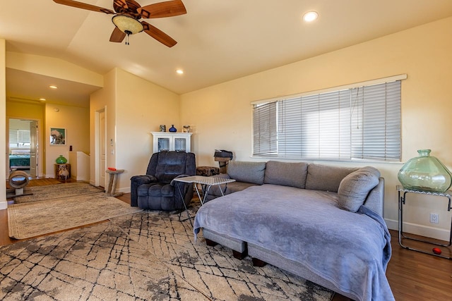 interior space with lofted ceiling, hardwood / wood-style flooring, and ceiling fan