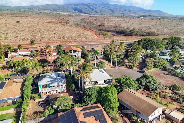 birds eye view of property featuring a mountain view