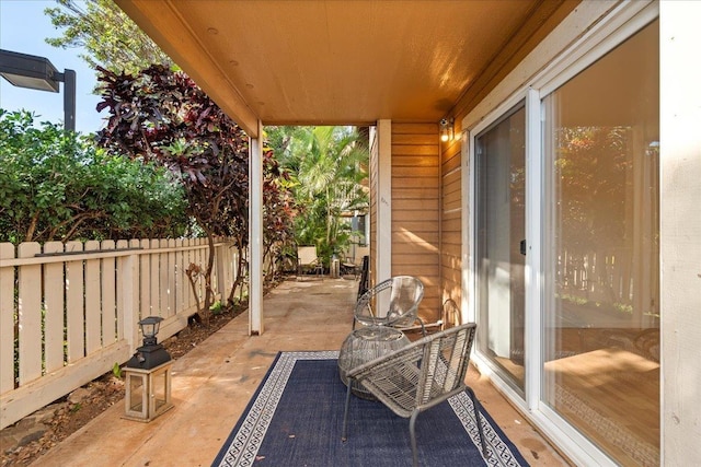 view of patio / terrace featuring fence