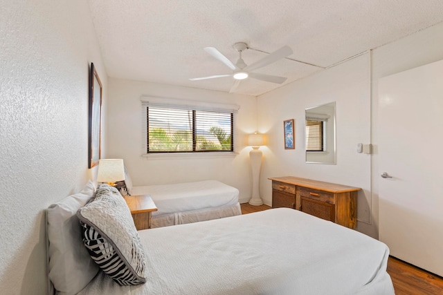 100 Hauoli St Unit 303, Wailuku, HI 96793 - bedroom featuring wood finished floors and a ceiling fan