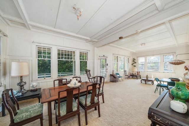 sunroom with coffered ceiling and beam ceiling