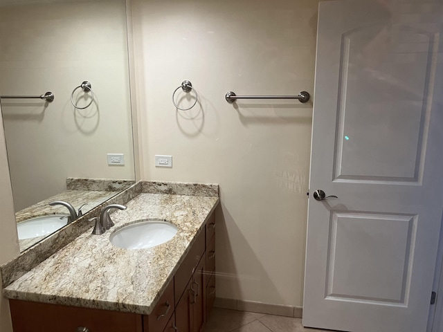 bathroom with vanity and tile patterned floors