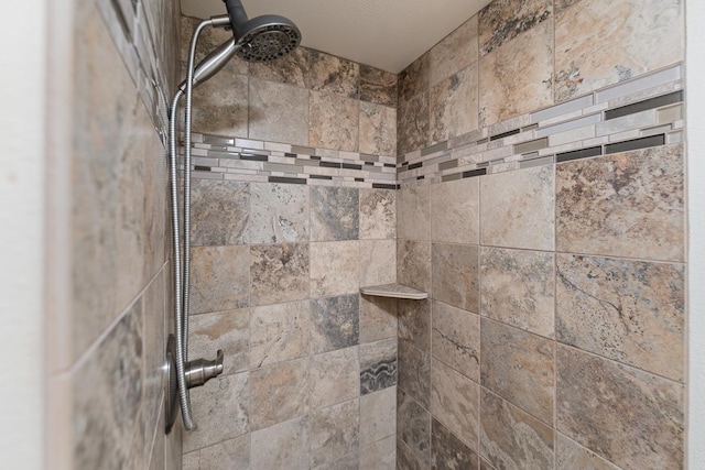 details featuring a tile shower