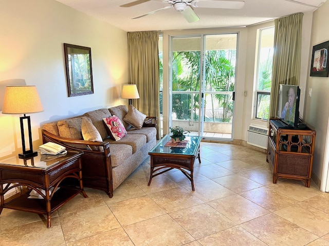 tiled living room with a wall mounted air conditioner and ceiling fan