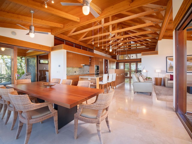 dining space featuring wooden ceiling, ceiling fan, lofted ceiling with beams, and light tile patterned floors