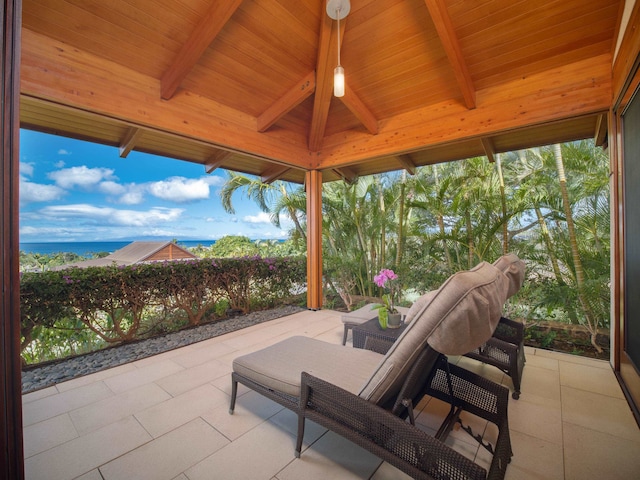 view of patio / terrace with a gazebo and a water view