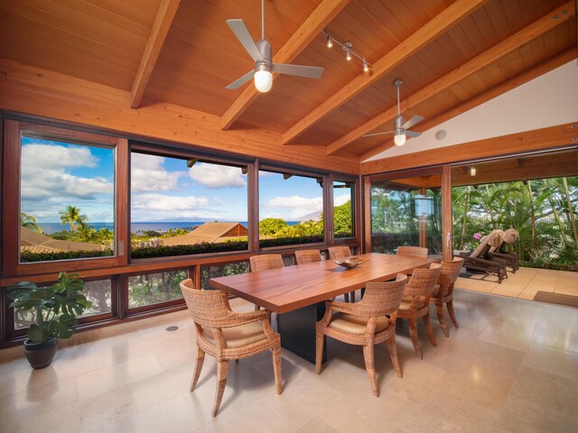 sunroom / solarium featuring vaulted ceiling with beams, ceiling fan, and wooden ceiling