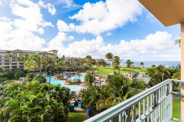 balcony featuring a water view