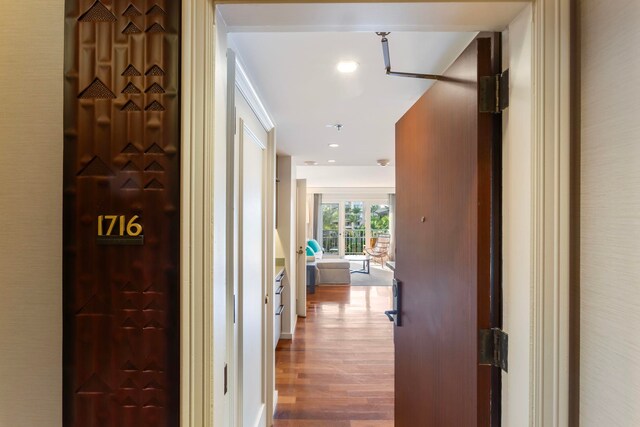 hall featuring hardwood / wood-style flooring