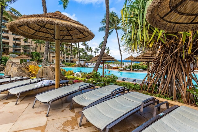 view of patio featuring a community pool