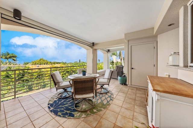 view of patio / terrace featuring a balcony