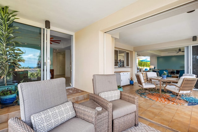 view of patio featuring ceiling fan