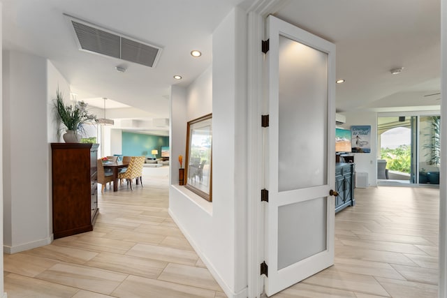 hallway featuring light wood-type flooring