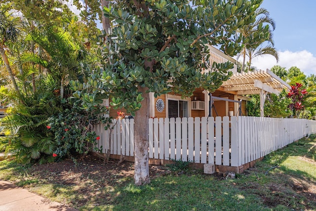 140 Uwapo Rd Unit 9-103, Kihei, HI 96753 - view of side of property with a pergola