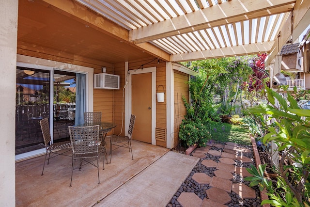 140 Uwapo Rd Unit 9-103, Kihei, HI 96753 - view of patio with a wall mounted AC and a pergola