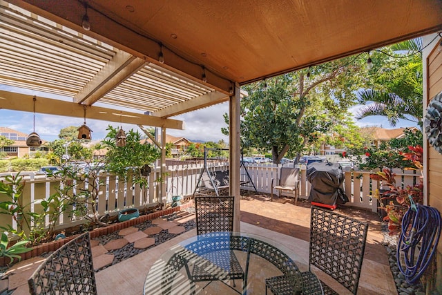140 Uwapo Rd Unit 9-103, Kihei, HI 96753 - view of patio with a pergola and outdoor dining area