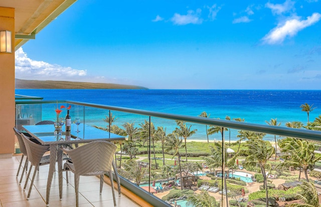 balcony featuring a water view