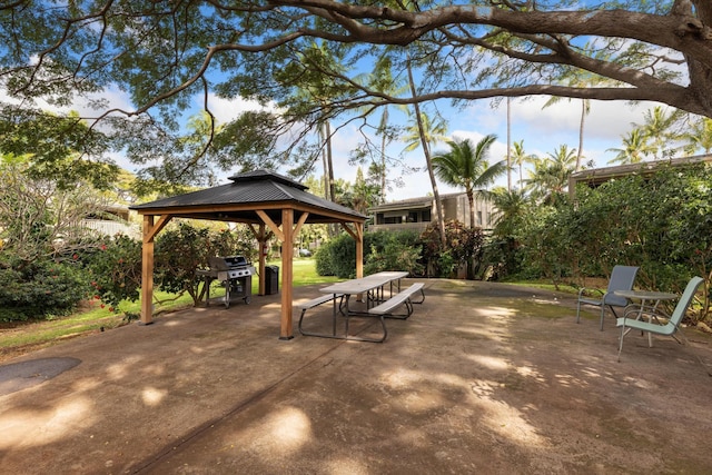 view of patio featuring a gazebo and a grill