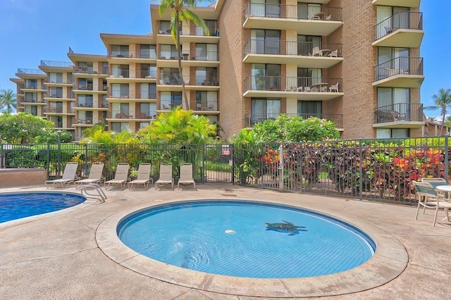 view of swimming pool with a patio area