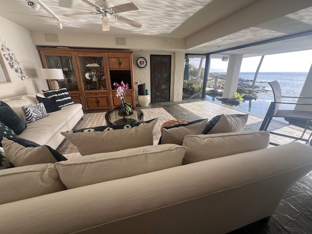 5163 Lower Honoapiilani Rd, Lahaina, HI 96761 - living area featuring ceiling fan and track lighting