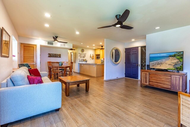 3600 Wailea Alanui Dr Unit 1101, Kihei, HI 96753 - living room featuring ceiling fan, light wood-style floors, and recessed lighting
