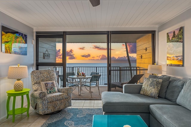 tiled living area featuring wooden ceiling and a water view