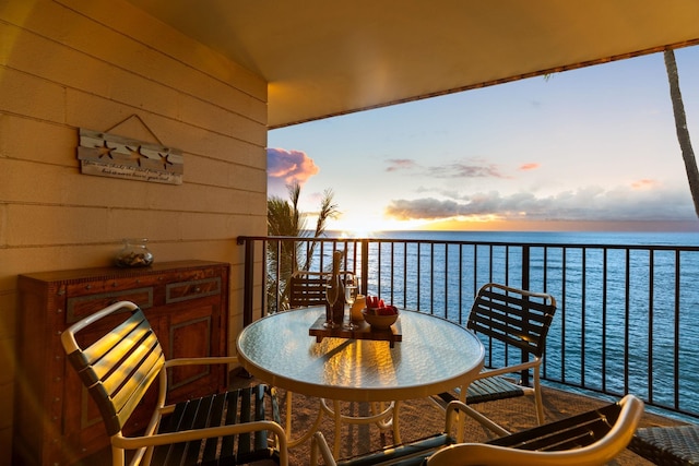 balcony at dusk with a water view