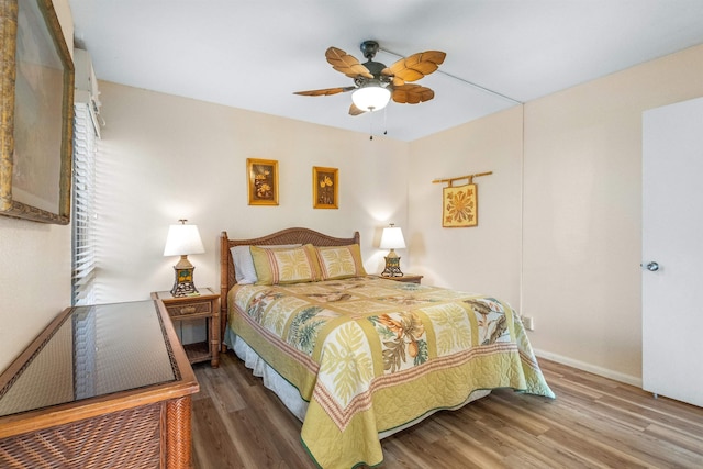 bedroom featuring wood-type flooring and ceiling fan