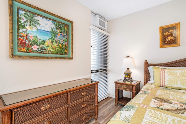 bedroom featuring wood-type flooring