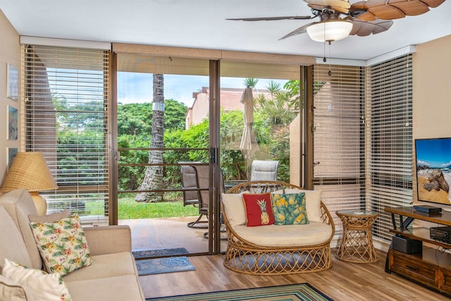 interior space featuring hardwood / wood-style floors and ceiling fan