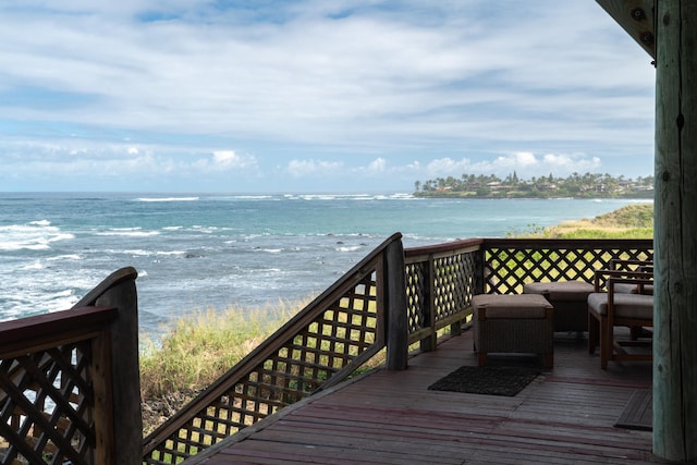 wooden deck with a water view