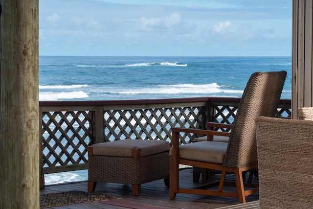 balcony featuring a water view