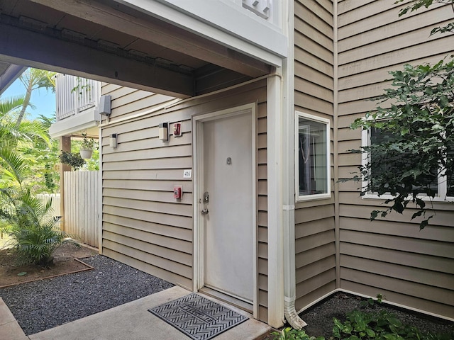 doorway to property featuring a balcony