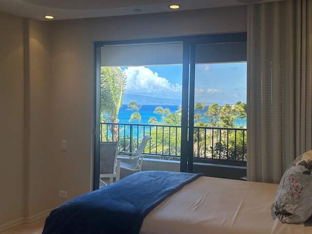 50 Nohea Kai Dr Unit 1-703, Lahaina, HI 96761 - bedroom featuring baseboards, multiple windows, recessed lighting, and a water view